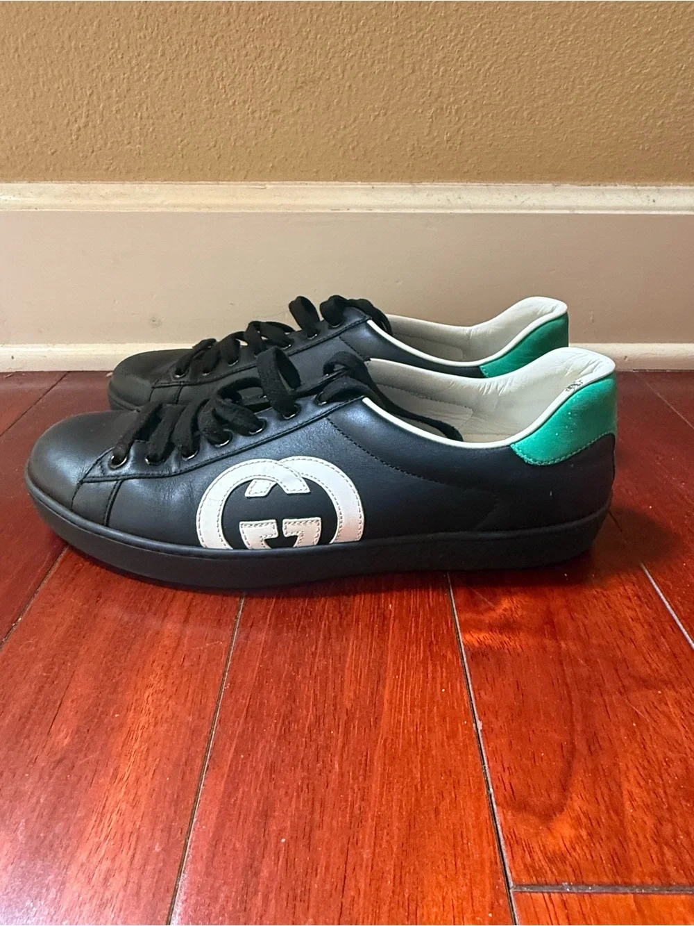 Gucci Black Leather Sneakers with White GG Logo and Green Heel